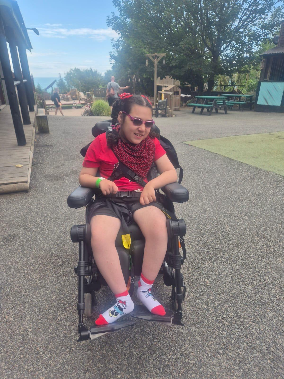 A young traveller enjoying the playground on a Jumbulance day out